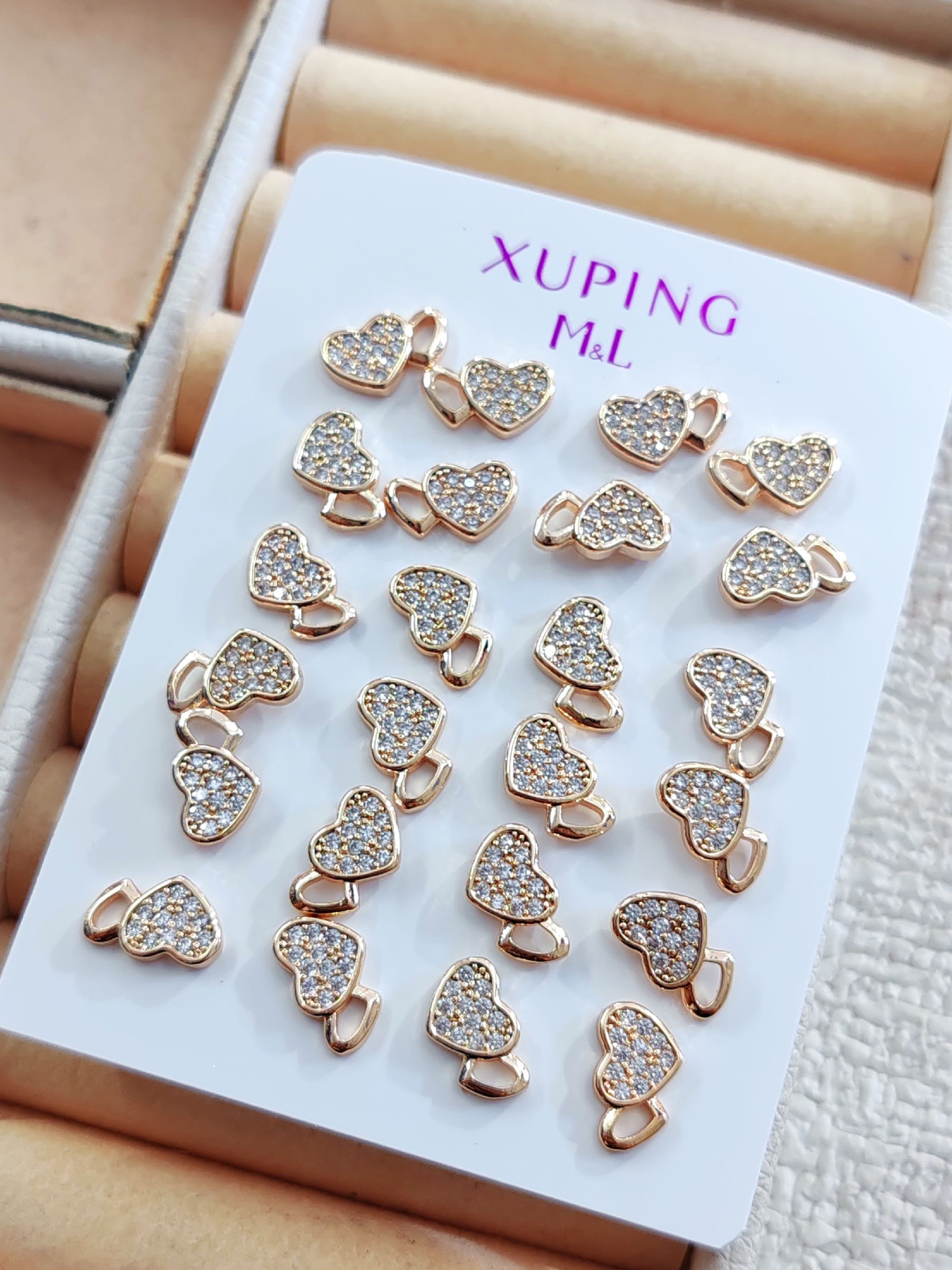Aretes corazón ala xuping