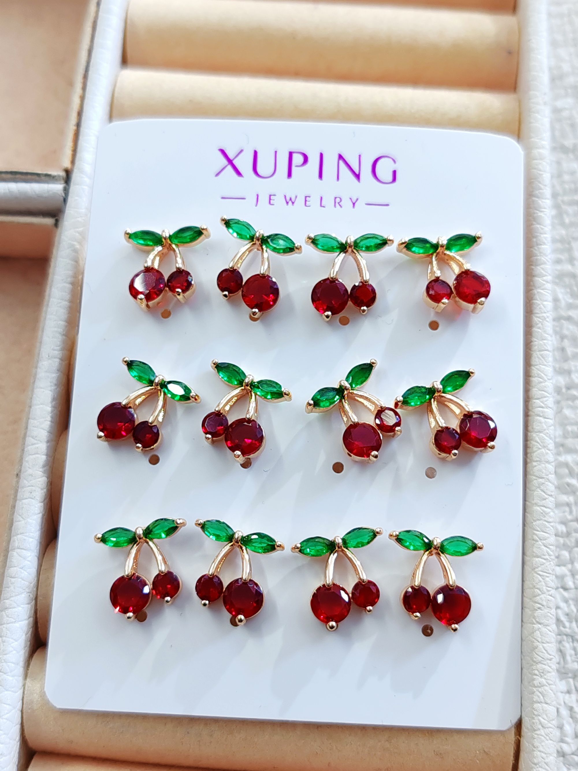 Aretes cereza y florcita xuping